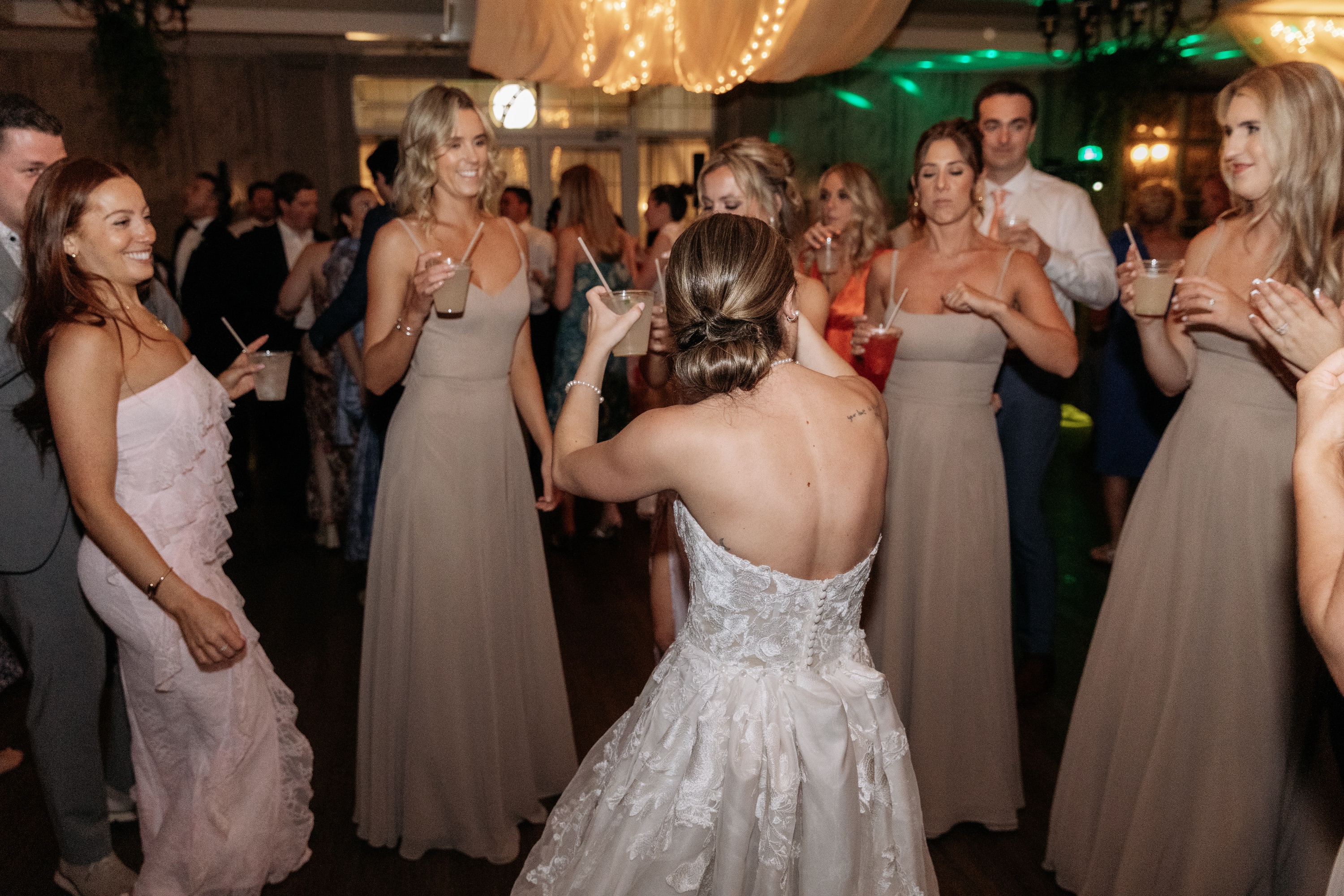 Bride dancing with her wedding party
